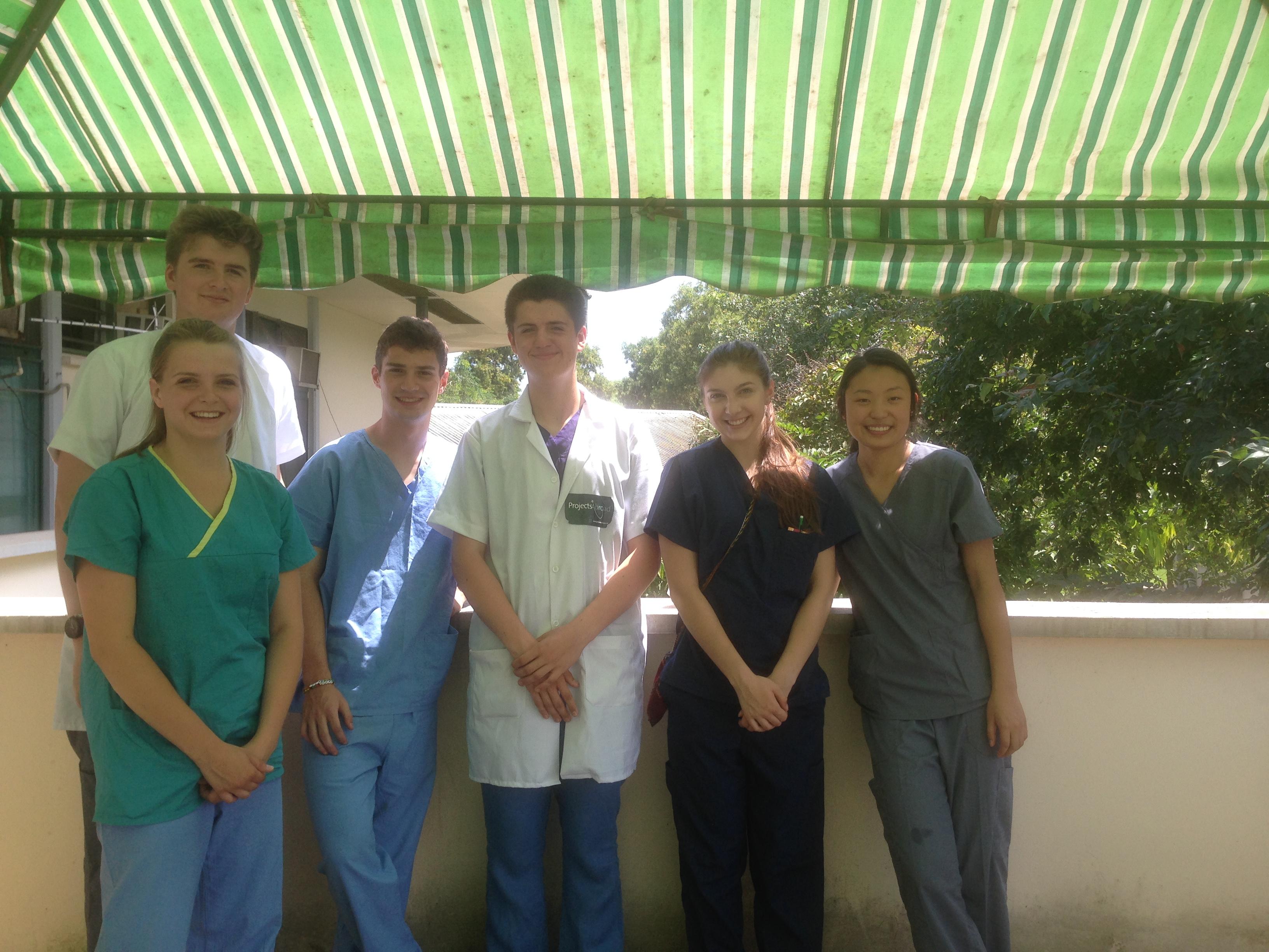 Medicine interns take a picture at the hospital in which they are completing their pharmacy internship in Ghana with Projects Abroad. Medicine interns with Projects Abroad take a picture at the hospital during their pharmacy internship in Ghana.